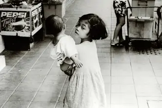 little girl analog with doll