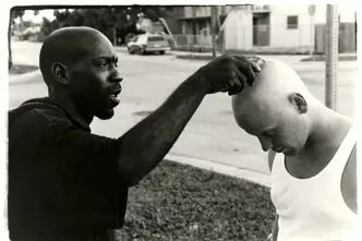 two man interacting b&w