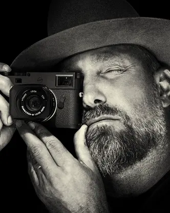 Close-up of a man taking a picture. 
