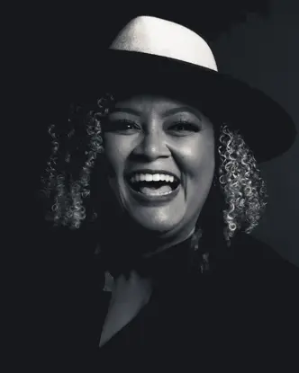 Portrait of a smiling woman wearing a hat