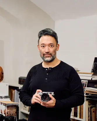 Wilfried Hedenborg with his leica camera