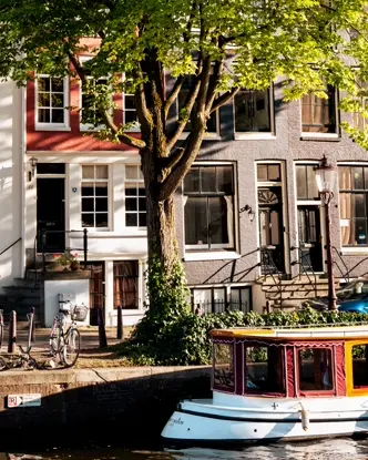 Colour image of a canal in Amsterdam