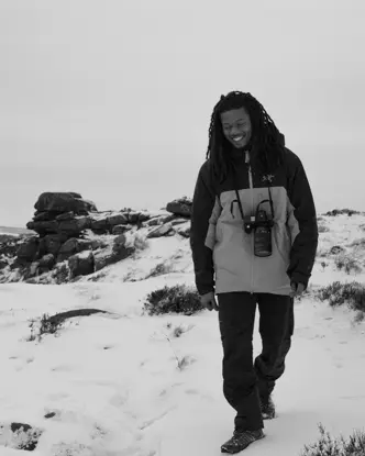 Black and White photo Of Henry Jay Kamara with the SL3-S.