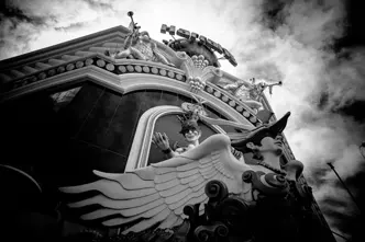 statue wall at a park b&w