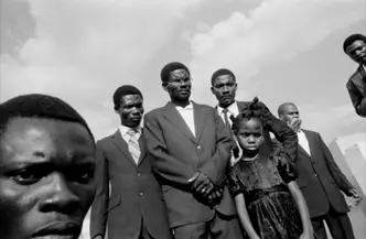 a group of people of colour b&w
