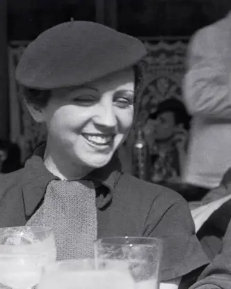 Robert Capa and Gerda Taro 1936 sitting in a cafe