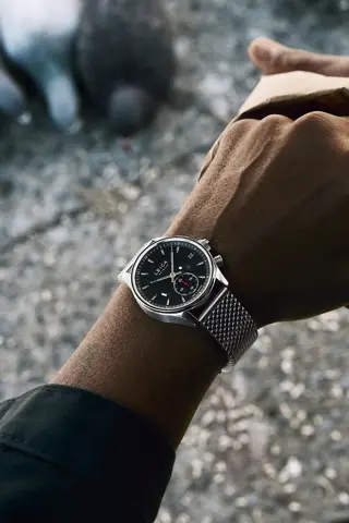 Jason Roman checks his Leica Watch