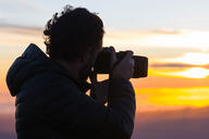 Levison Wood with the SL3 with the sunset in the background