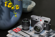 Leica M and Leica Summilux-M positioned on the LFI magazine.