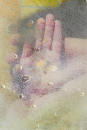 a hand pale color in transparency