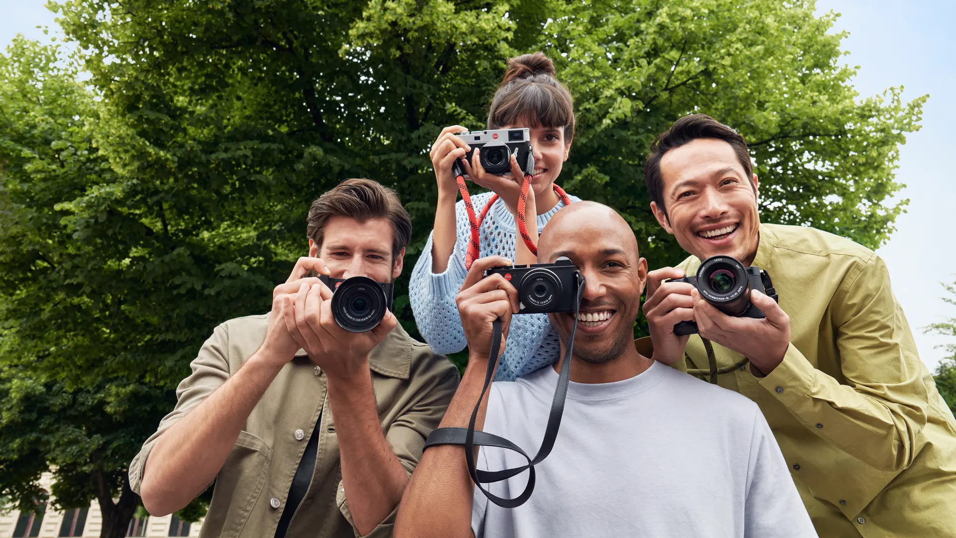 Group of people with leica cameras